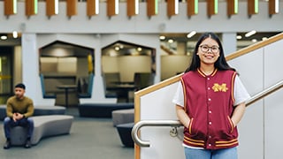 Student smiling on campus