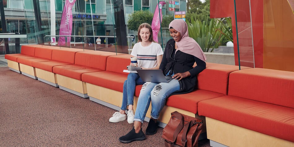 https://www.deakin.edu.au/__data/assets/image/0006/2862609/29514_950x475_two_deakin_students_smiling.jpg