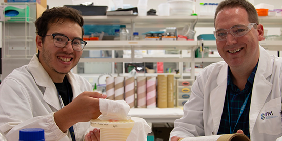 PhD candidate Martin Zaki and Dr Ben Allardyce display the undegummed silk fibres and fabric they created in the IFM lab 