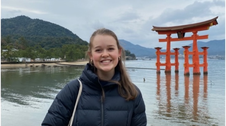 Petra in front of Japanese statue